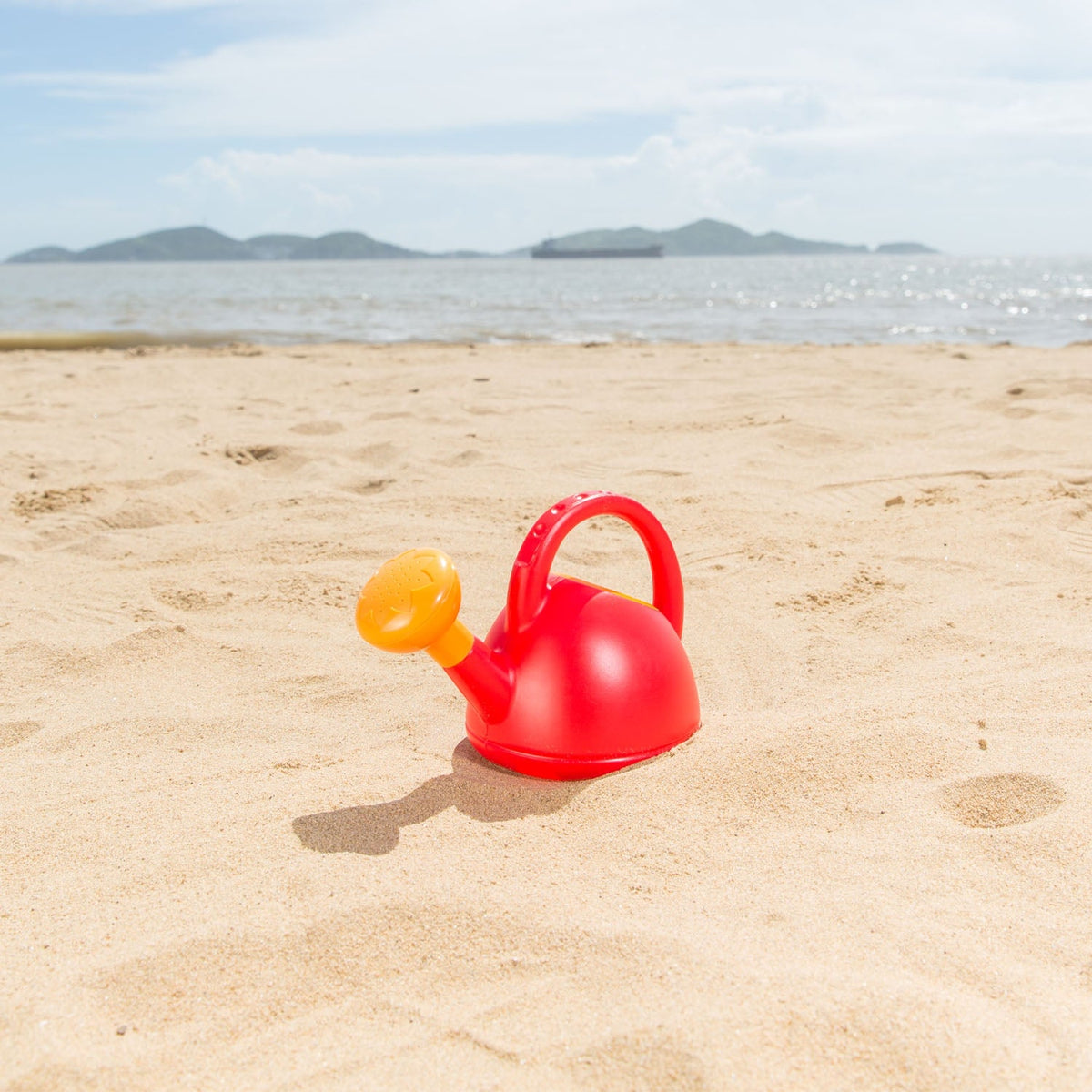 Hape store watering can